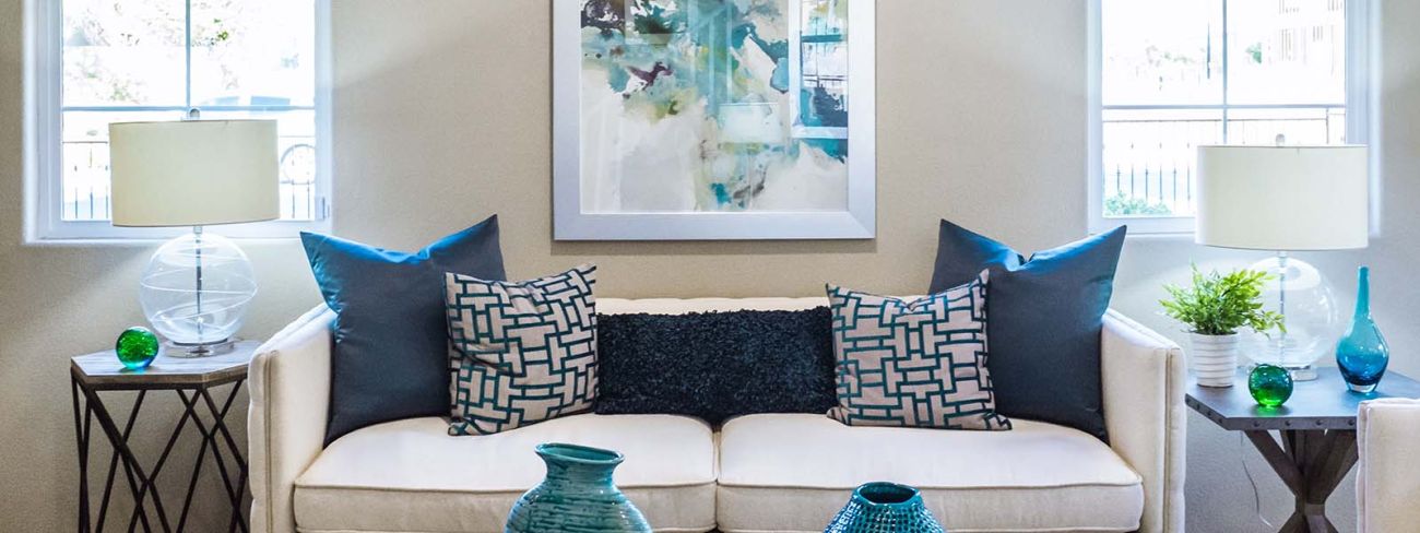 living room with blue accent pillows